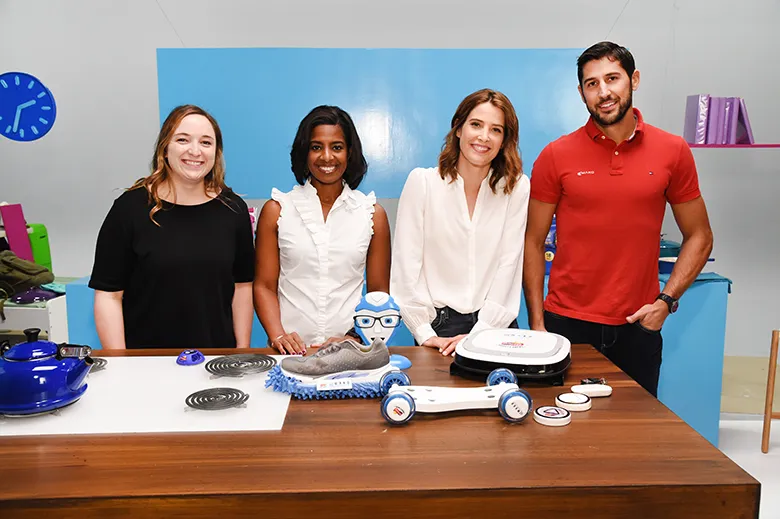Cobie Smulders (third right) and the product design team