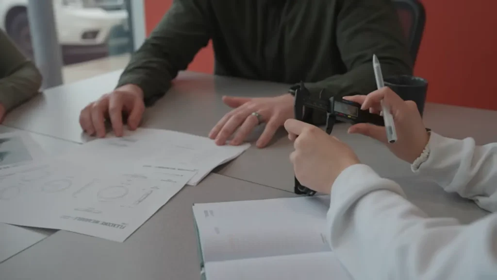 Comparing manufactured part to design specifications